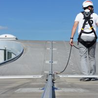 VERTIC's COMBIRAIL inclined fall protection rail system with switch